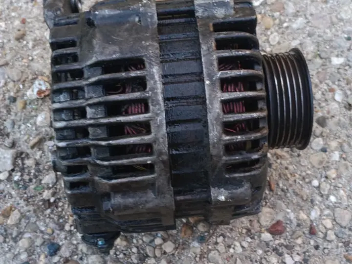 Alternator removed for replacement or service.
