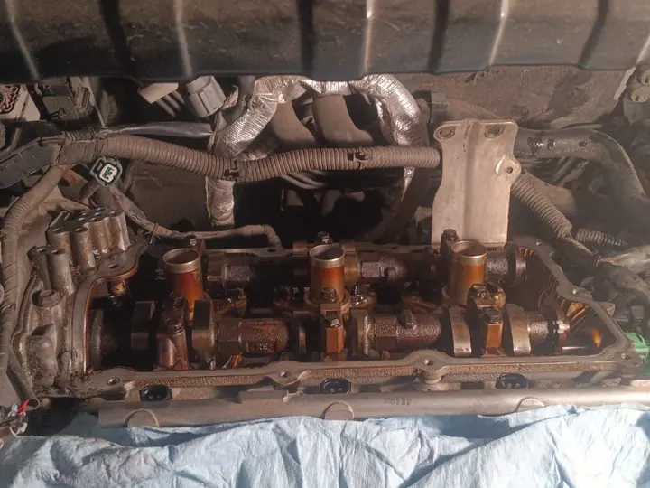Inspection of the caliper and nearby components.